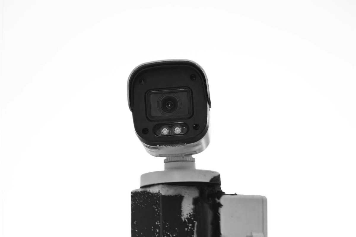 smartest home security features including AI detection, encrypted video feed, and two-way audio on a modern indoor camera
